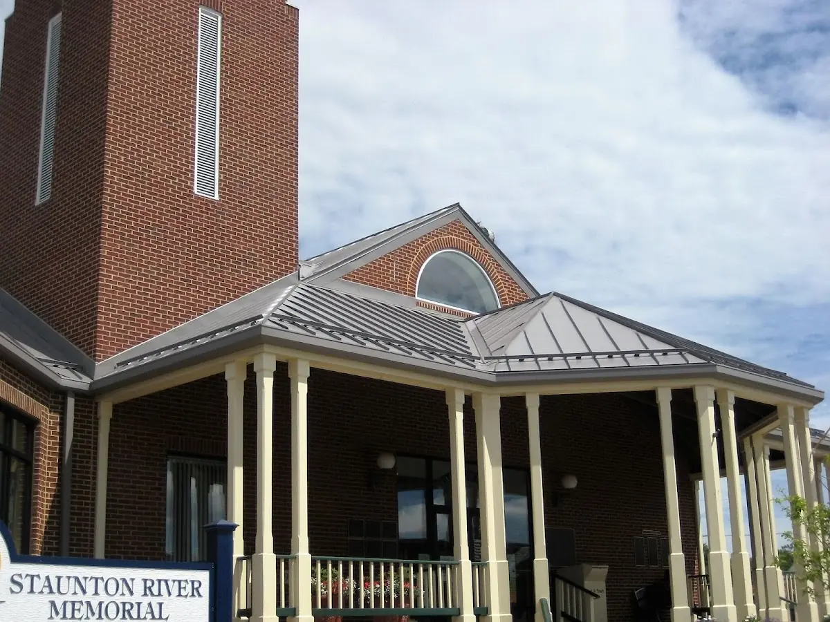 Skilled roofing craftsmen working on a residential roof in Swatara